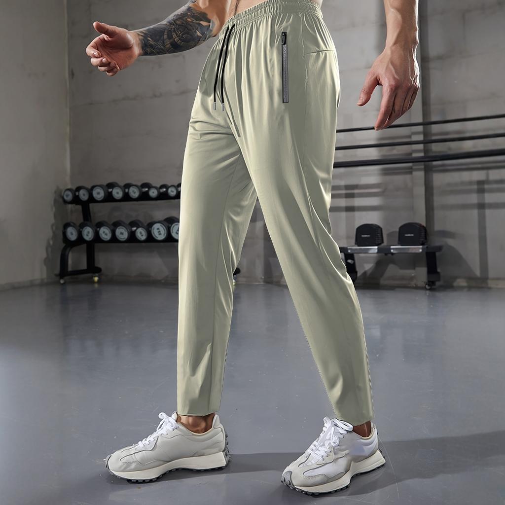 Herren Freizeit-Sporthose, Hochdehnbare Webware, Einfarbig, Normale Passform mit Kordelzugbund und Reißverschluss