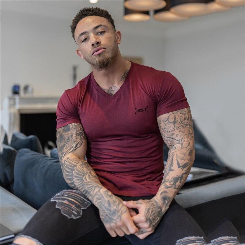 Muscleguys Summer Men’s Casual Fashion All-match T Shirts Cotton V-neck Printed Short-sleeve Bodybuilding Fitness Tops Best Seller