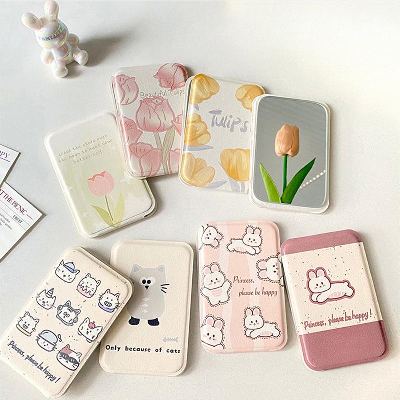 Stolní kosmetické zrcátko Jednobarevné PU kůže Jednoduché Přenosné Ruční kosmetické zrcátko Skládací Studentské Kompaktní Roztomilé Kapesní zrcátko