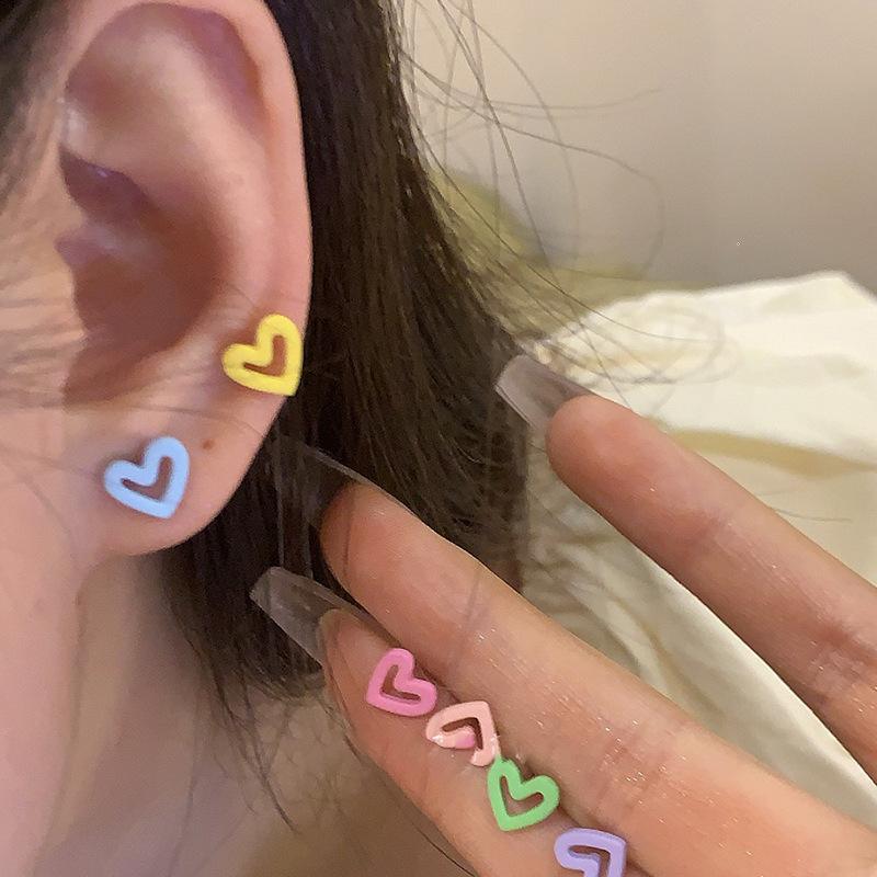 Silver needle dopamine love hollow earrings simple small fresh temperament stud earrings niche fashion versatile earrings