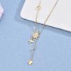 Elegant Gold Titanium Steel Women's Necklace with White Shell, Zircon, and Monogram Tassel