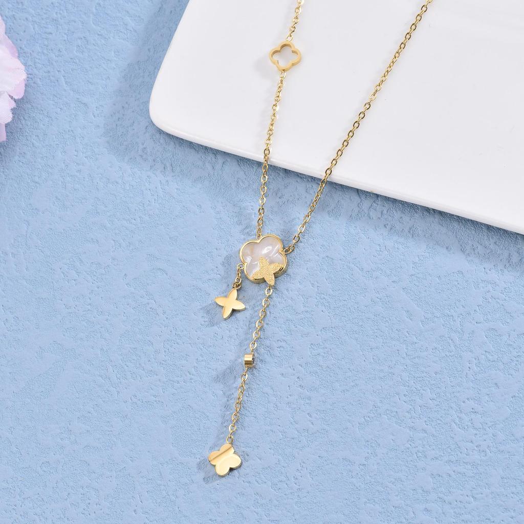 Elegant Gold Titanium Steel Women's Necklace with White Shell, Zircon, and Monogram Tassel