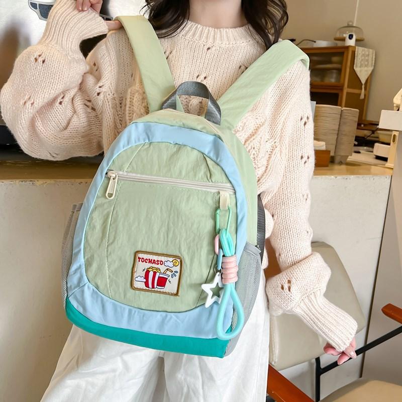 School bag summer new cute Korean children's research small backpack Coco love love ice cream contrasting color soft girl travel backpack