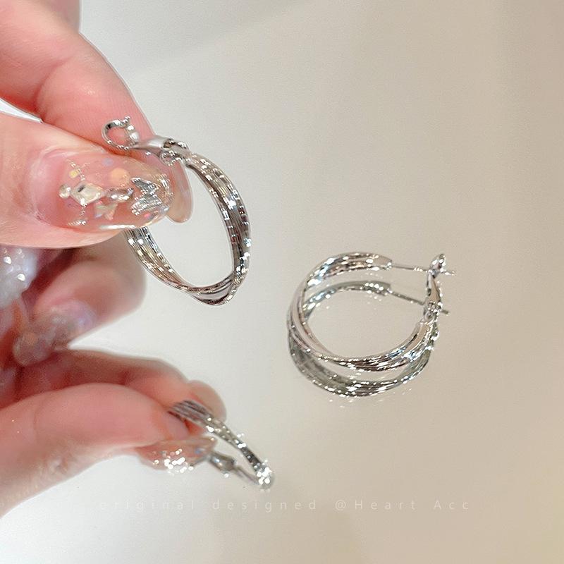 Elegant Silver Hoop Earrings with Unique Design for Women