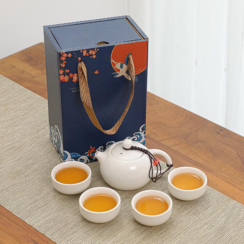 

Ceramic Kung Fu tea set, one pot, two cups, four cups, accompanying gifts for real estate business activities