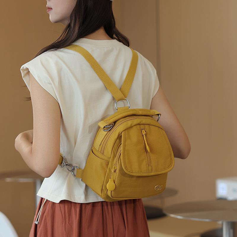 

Autumn 2025 Minimalist Nylon Women s Bag: Versatile Single Shoulder, Backpack & Crossbody. Below 20L
