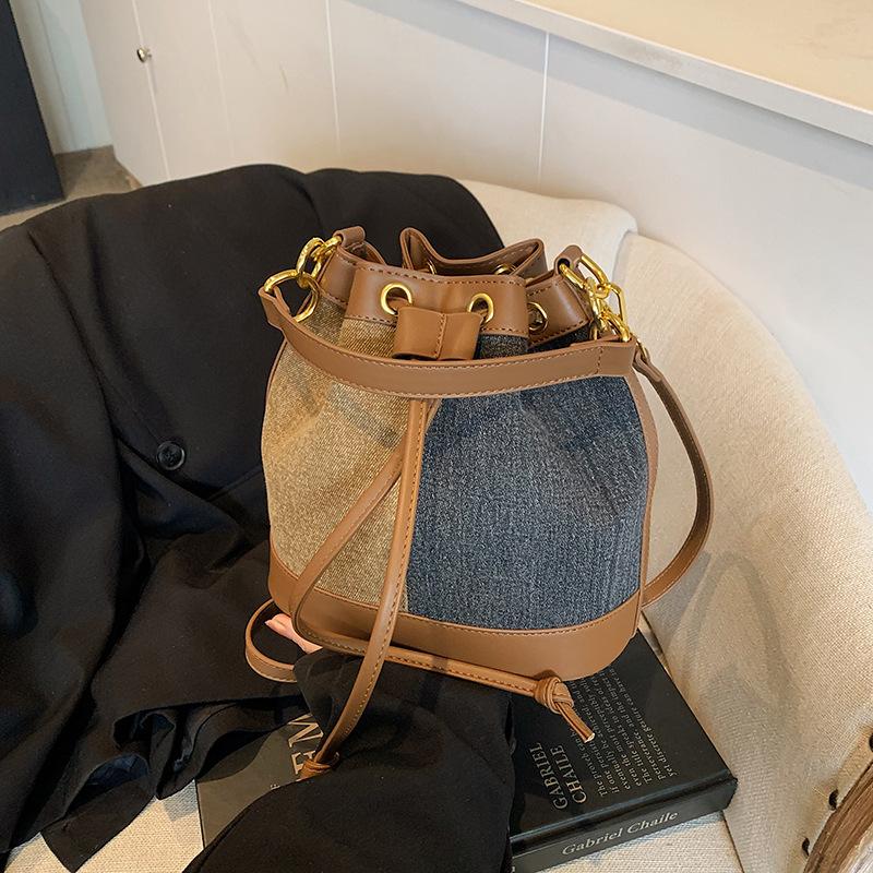 

Новая женская сумка 2025 популярная сумка-ведро осень и зима нишевый дизайн сумка-мессенджер ощущение высокого класса работа маленькая сумка