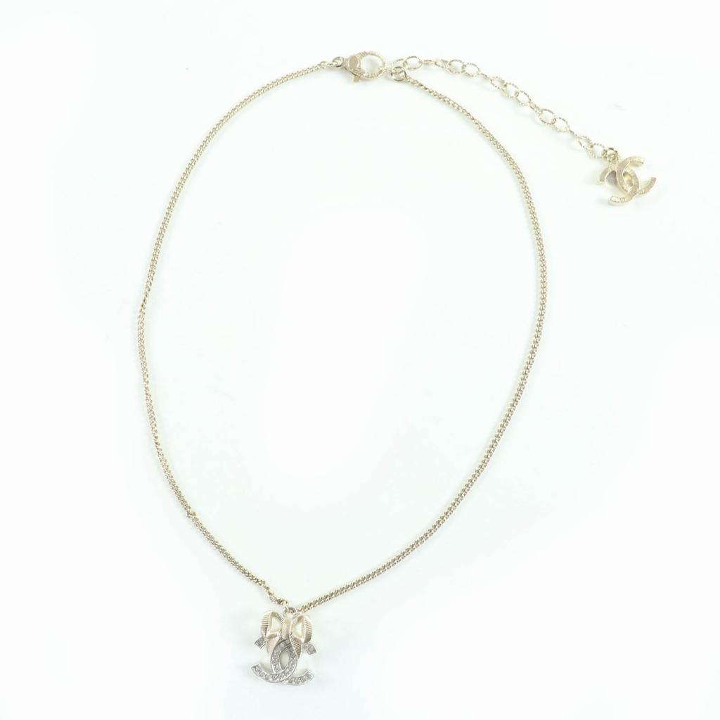 Excellent CHANEL Necklace COCO Mark Ribbon Rhinestone Champagne Gold Women B24K Used