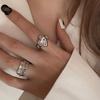 Silver Artistic S925 Open Ring With Unique Twisted Design And Delightful Heart Shaped Zirconia Pink