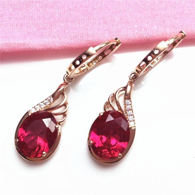 Purple Gold Shiny Red Stone Egg Surface Ear Buckle Simple Luxury Temperament Design Rose Gold Plated Earrings