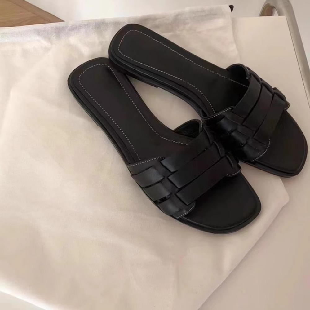 Шлепанцы на плоской подошве для женщин 2025 Новые Нескользящие Плетеные Сандалии на одном слове Женские Летние для улицы Пляжные шлепанцы для женщин