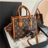 New high-end fashion contrasting color commuter bag portable shoulder oblique span women's bag