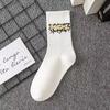 Trendy White Cotton Sports Socks for Couples - Mid-Calf, Autumn/Winter Men's Basketball Long Socks