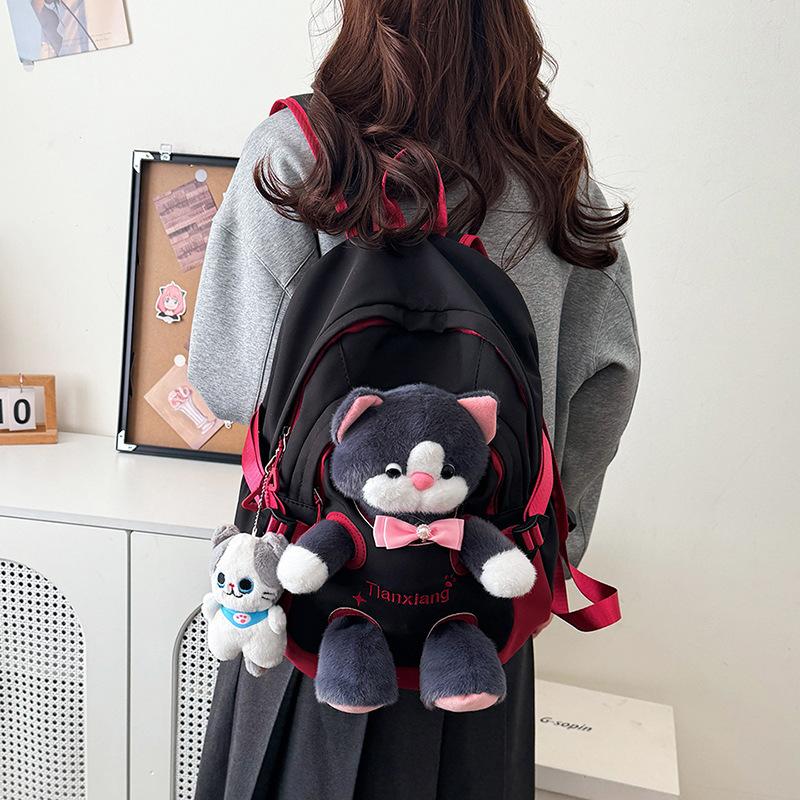 Schoolbag autumn new cute cat doll backpack female junior high school high school schoolbag large capacity campus style cute fun backpack