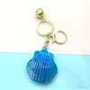 Iridescent Shell Starfish Keychain Pendant - Unique Accessory & Gift