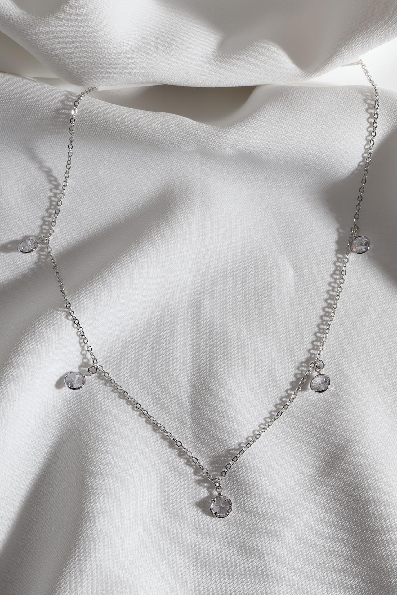 

Серебряное колье с рядами круглых камней