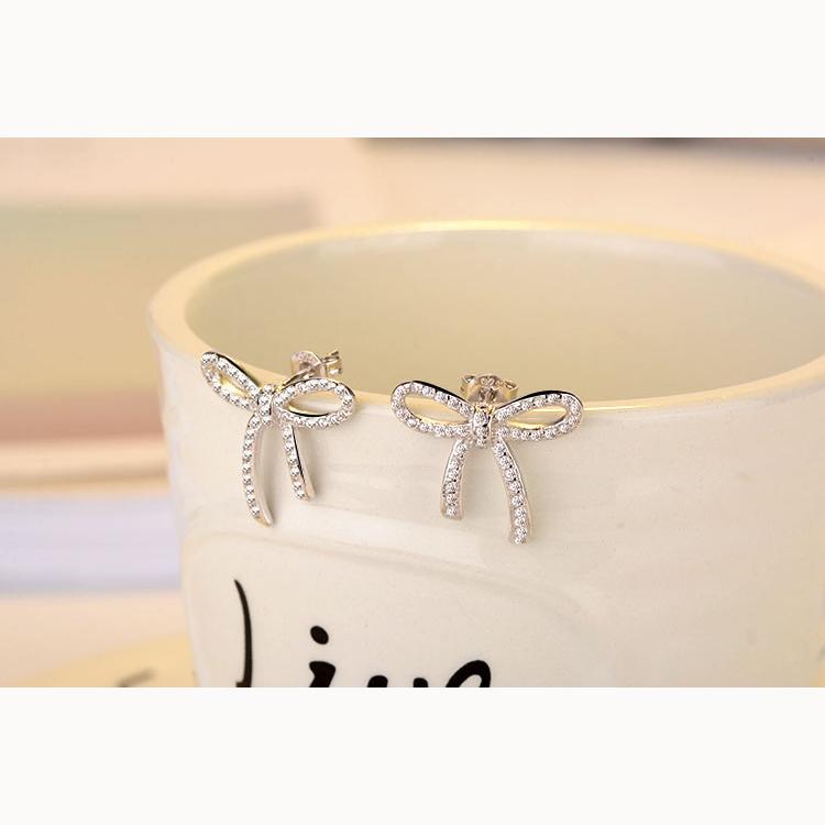 

Мода Темперамент Элегантные Ювелирные Изделия Серьги Атмосфера Личность Бант День Святого Валентина Подарок Девушке Подарок Цирконий Серьги copper белого золота