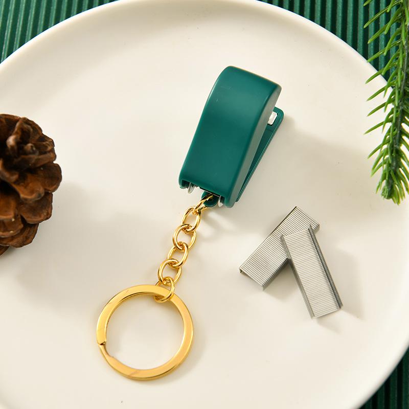 Vánoční kreslená mini sešívačka s klíčenkou - Roztomilý studentský dárek