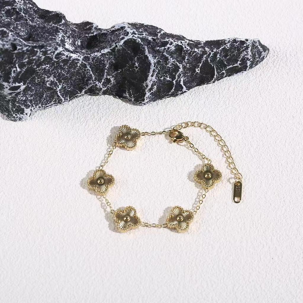 Elegant Titanium Steel Four-Leaf Clover Bracelet with Five-Petal Design