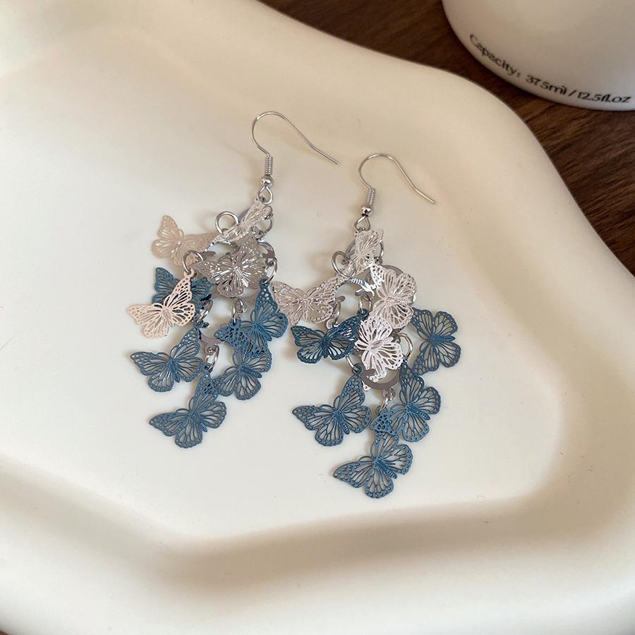 

Hollow butterfly fringed ear hook seaside vacation style simple fashion temperament earrings niche high-end earrings