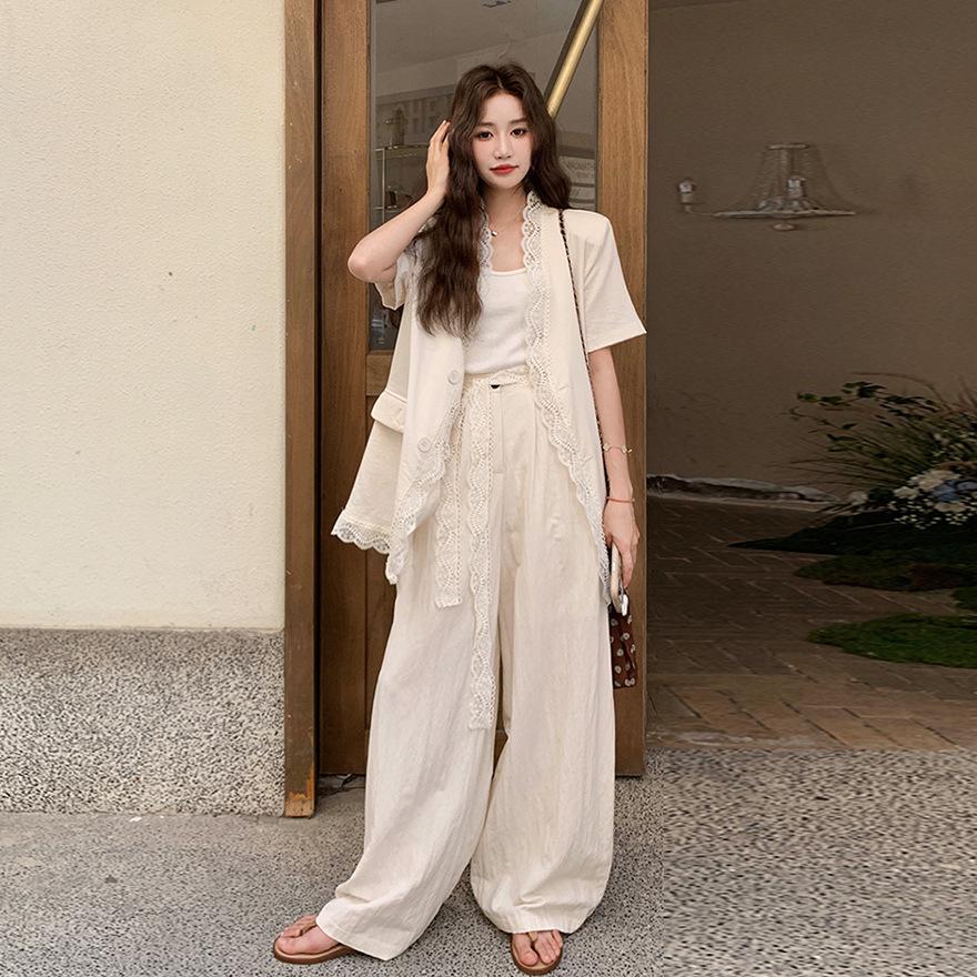 

Атмосферный костюм для ношения Женский летний новый кружевной жакет с высокой талией и широкими брюками Комплект из двух предметов XL