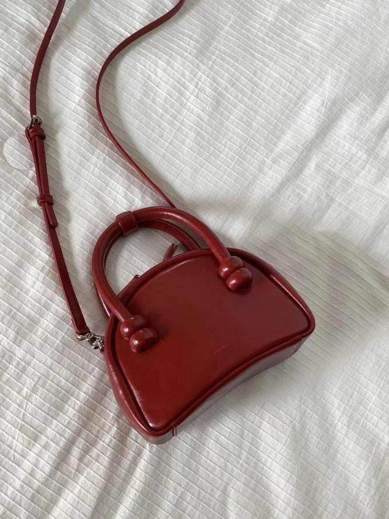 

Сумка з нішевим дизайном, жіноча сумка в раковині 2024 року, повсякденна нова високоякісна універсальна сумка через плече з текстурою червоний