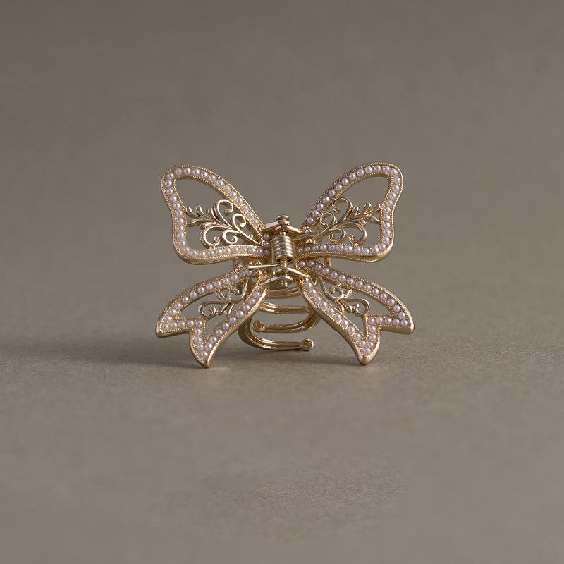 

Полая заколка для волос с жемчугом и ирисами-бабочками, темпераментная, роскошная, с высоким чувством стиля, модная, универсальная, супер-фея, женские аксессуары для волос