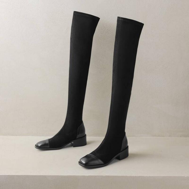 

Autumn and winter women s elastic leather boots Korean version of the new large size women s boots low heel comfortable square heel sleeve solid co 39