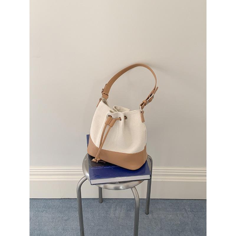 New bucket bag women's drawstring pleated bag niche splicing design women's shoulder bag canvas
