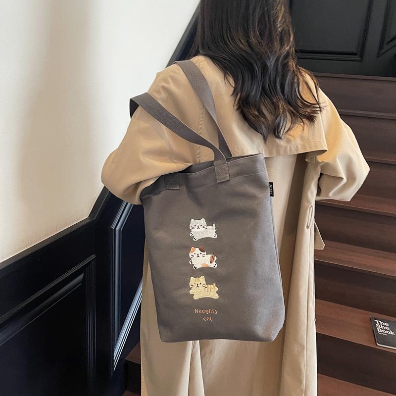 2025 summer new tote bag commute to work large capacity cartoon solid color trend niche foreign shoulder bag