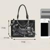 Dark style maze butterfly pain bag Toth girl holding the cross-body bag