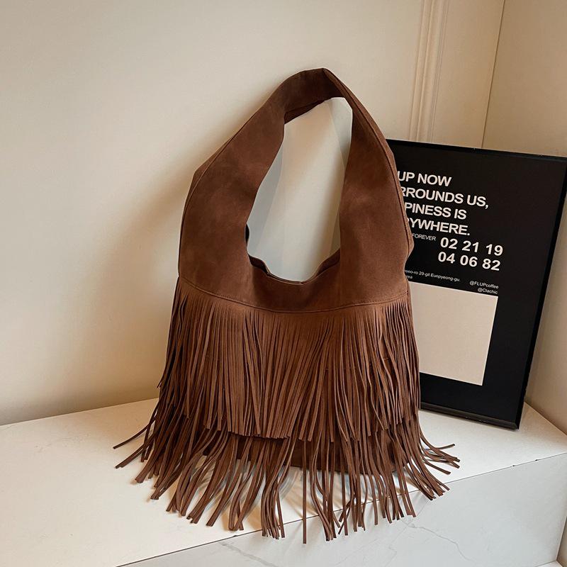 

Винтажная сумка-тоут из замши оленьей кожи с кисточками - Женская сумка через плечо большой вместимости, коллекция 2025 One Size коричневый