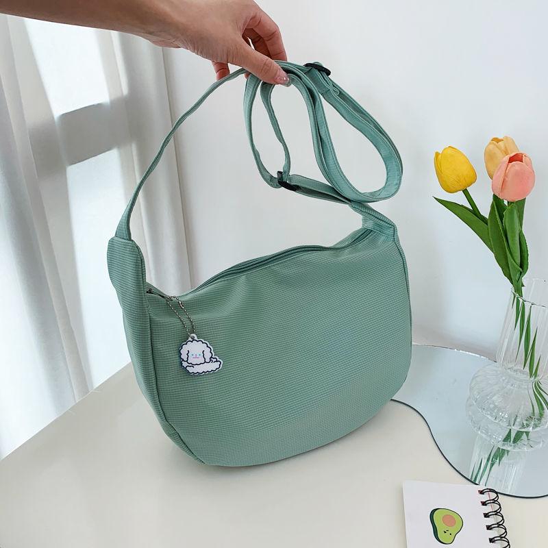 Kleine verse meisjes schoudertas effen kleur grote capaciteit schoudertas eenvoudige mode casual messenger bag dumpling tas