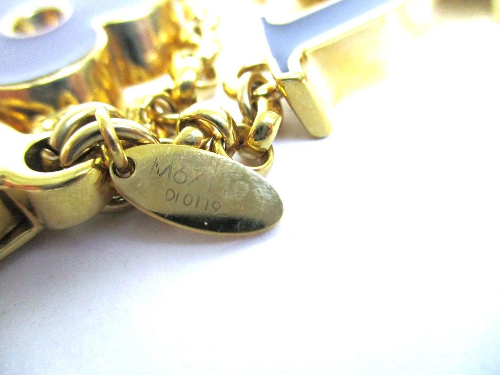 Authentic LOUIS VUITTON Gold Bag Charm Key Holder Sac Fleures du #a945  Refurbished