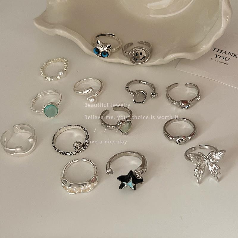 Fargeblokk Kattesøye Stjerne Ring: Trendy dame åpen statement-ring
