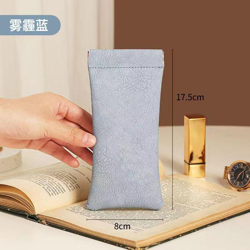 

Кожаная сумка для женских очков, портативная сумка для хранения очков с автоматическим закрыванием эластичного отверстия 17.5*8cm синий