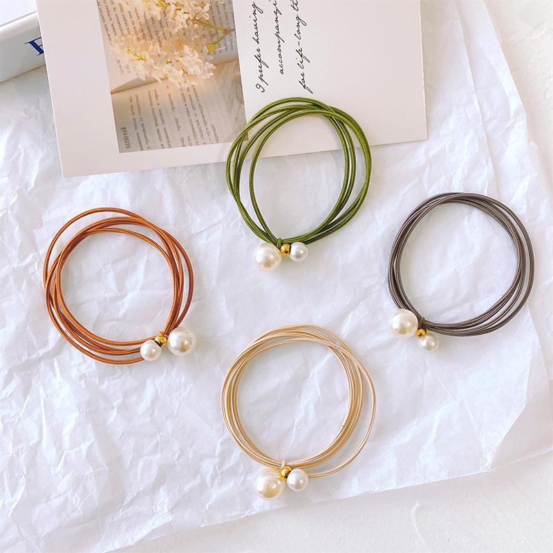 Elegant Korean Pearl Knot Hair Tie - High Elasticity Rubber Band Accessory.
