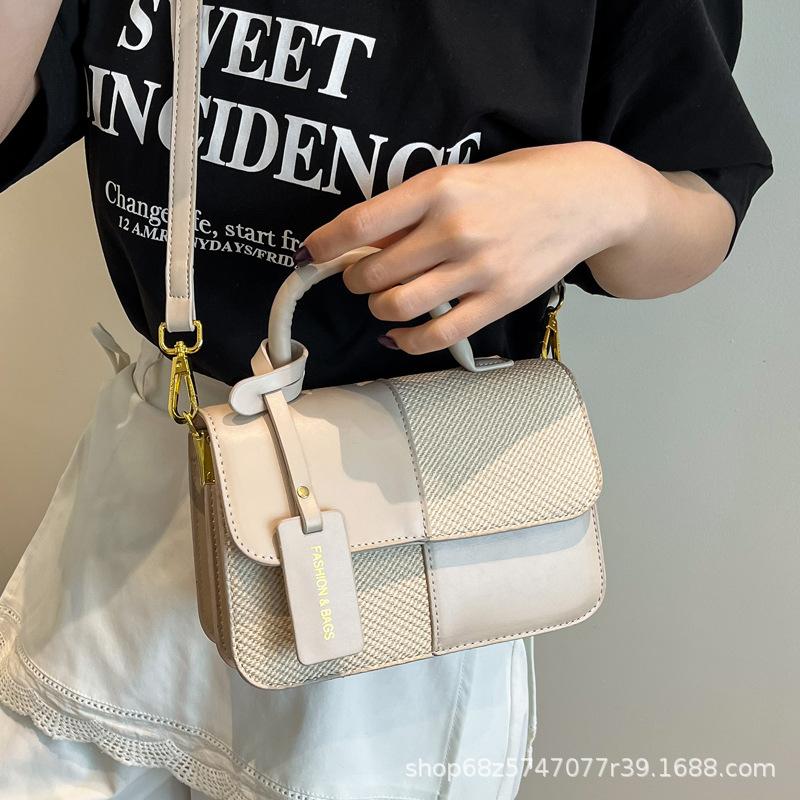 2025 new contrasting color retro portable small square bag female Sen Meng fashionable texture shoulder bag personalized commuter messenger bag