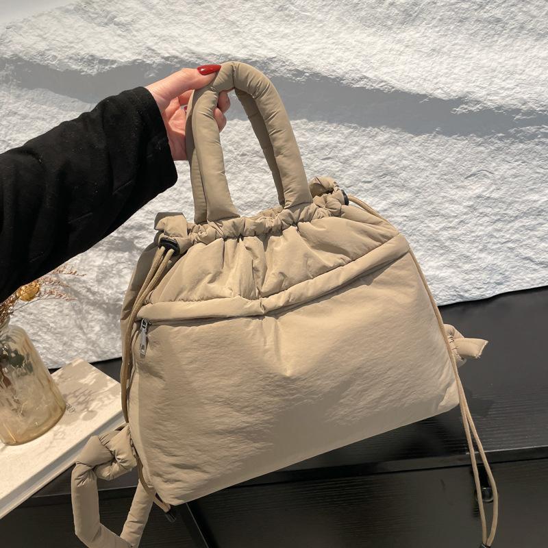 2025 New Large-capacity Shoulder Messenger Bag, Padded Wrist Bag, Lightweight Nylon Cloth Drawstring Messenger Bag, Backpack.