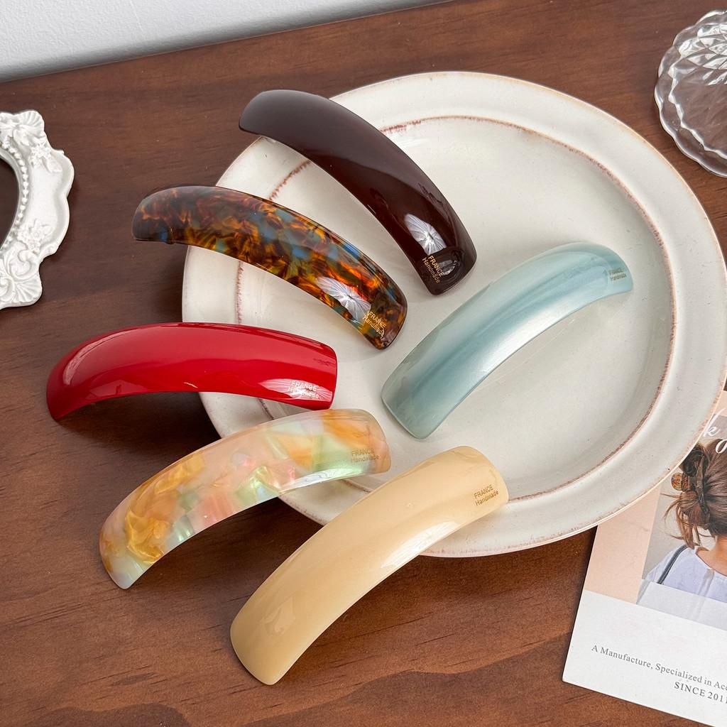 Högkvalitativ hårklämma i koreansk stil för eleganta halvuppsatta frisyrer i olika färger