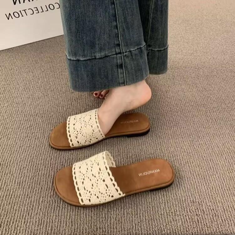 2025 summer new hollow lace flat-bottomed slippers women's simple solid color one-word drag casual women's cool slippers