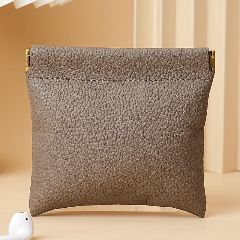 

Luxurious Black Litchi Leather Snap-Closure Jewelry & Lipstick Pouch