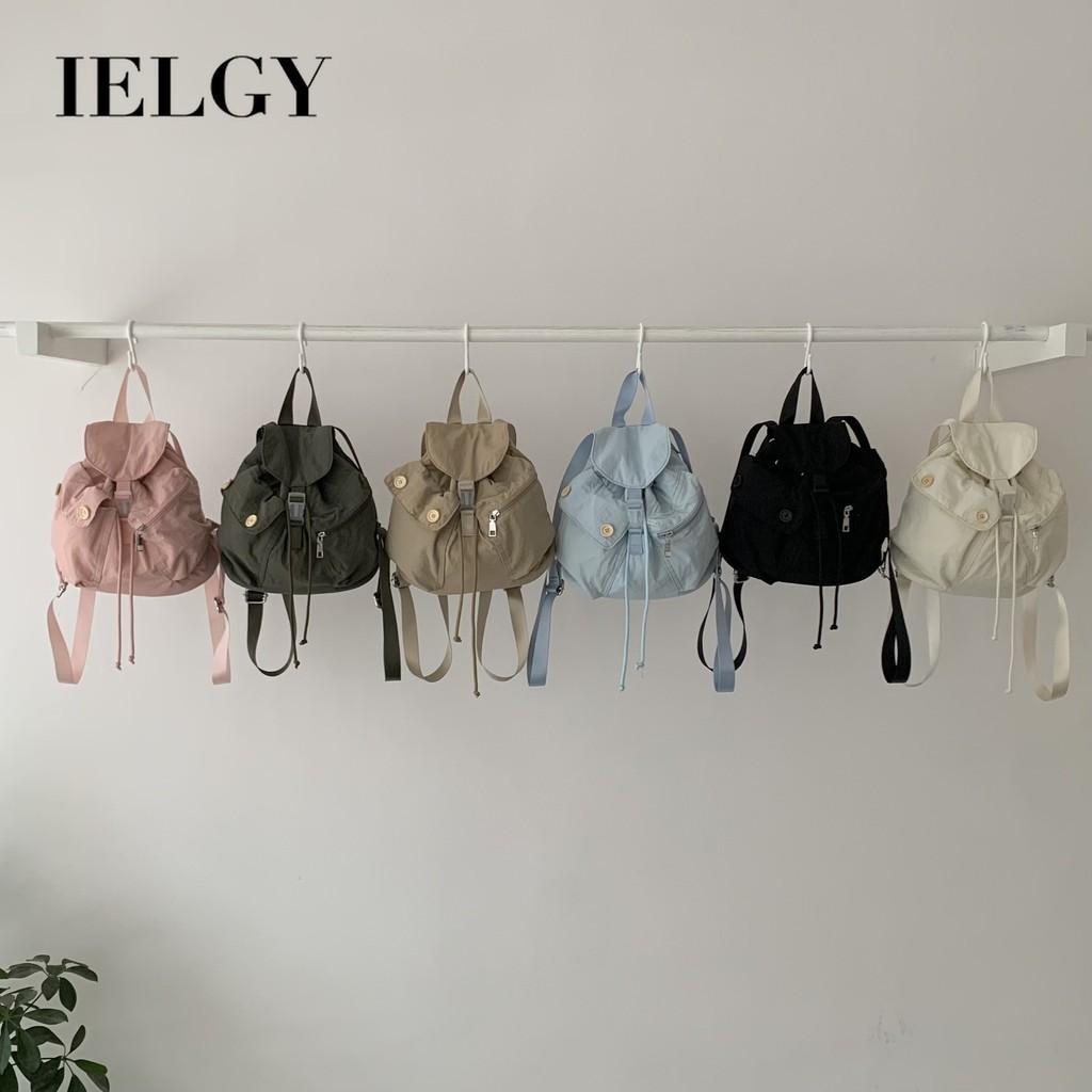 IELGY new Korean niche design outdoor pocket button drawstring double shoulder nylon backpack