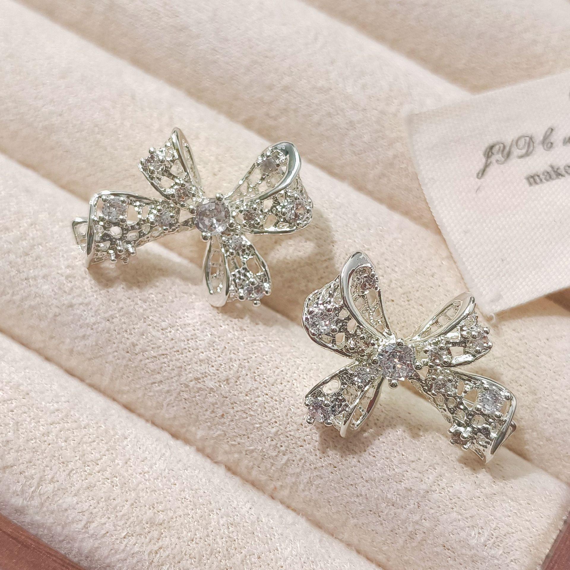 Copper Plated Hollow Bow Gold and Silver Zircon Stud Earrings - Retro Palace Style with Silver Needle Ornaments.