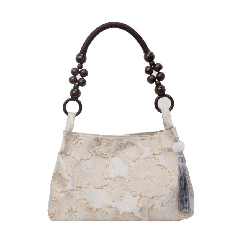 

New Chinese niche velvet embossed dark pattern versatile armpit bag, high-end retro foreign style wooden beads, shoulder hand bag