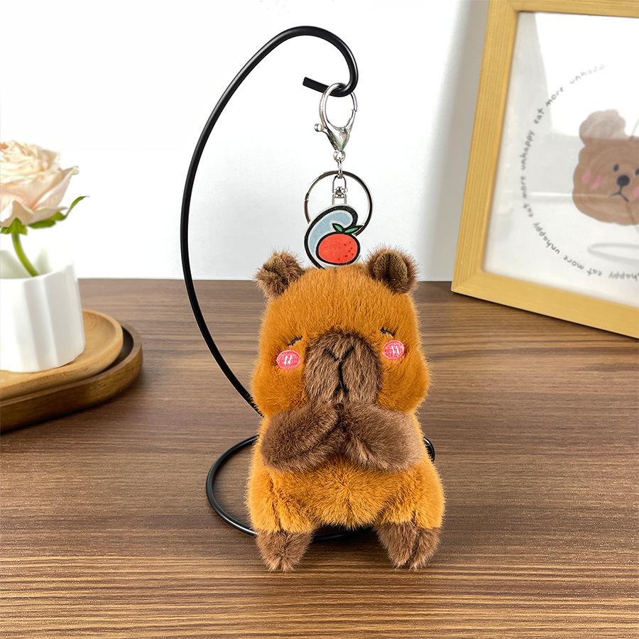 

Буддийская капибара плюшевые куклы одежда дзен куклы капибары сумки и подвески куклы, посыпанные и пойманные About 14cm high