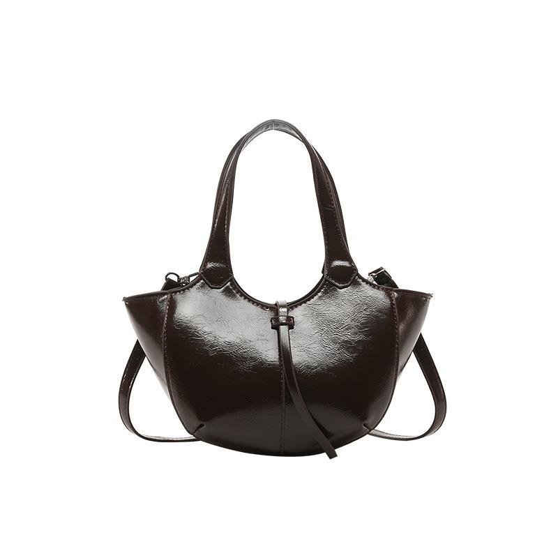 Nischenhandtasche, neue Damentasche für den frühen Frühling, hochwertige Retro-Schultertasche, einfache Pendler-Umhängetasche