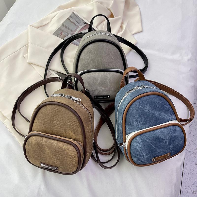 Schoolbag fashion mini small bag women's 1011 spring new trend foreign style backpack simple texture travel small backpack