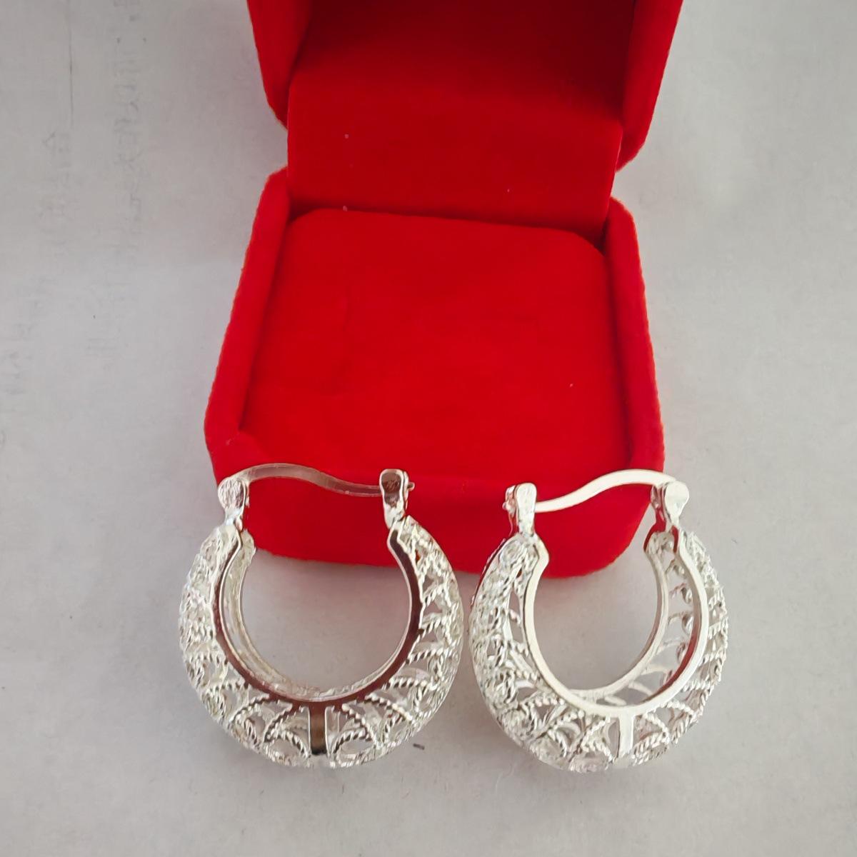 Silver-Plated Round Earrings with Hollow Flower Pattern – European  American Style Ear Cuffs