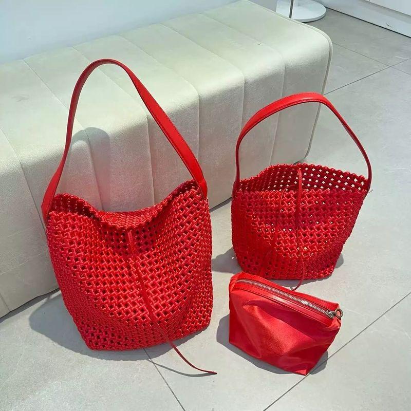 

Плетеная вручную сумка-ведро 2025 лето новая сумка-тоут на плечо/подмышку большой вместимости с полым узором для通勤/на каждый день, женская, универсальная Red Large (with inner bag) high quality In Stock